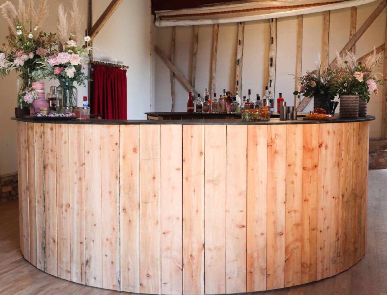 The ADevents 5-metre black Airstream kitchen, branded up and serving at an outdoor event.